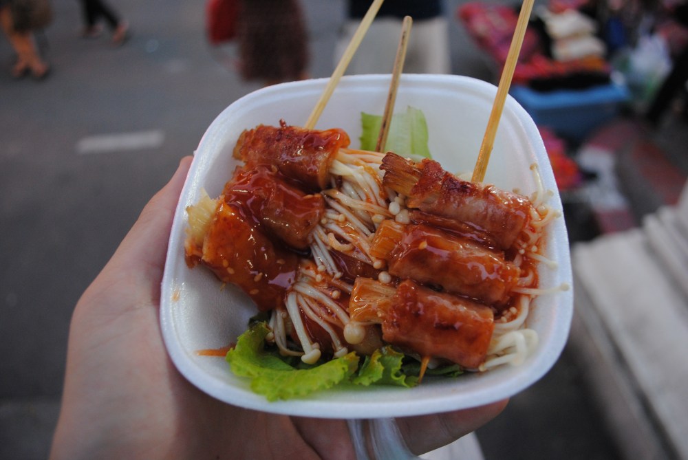 Mushrooms wrapped in thick bacon and topped with sweet chili sauce